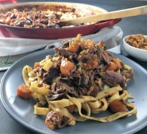 Slow cooked duck pasta - a deliciously easy combination of oven roasted duck simmered on the stove to create a rich flavourful sauce.