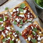 Puff Pastry Tomato Tart - transform a sheet of frozen puff pastry in to a spectacular tomato tart, casually strewn with basil & crumbled fetta - and so EASY!