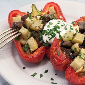 leftover lamb stuffed peppers (capsicums) with potatoes and basil topped with greek yoghurt yogurt