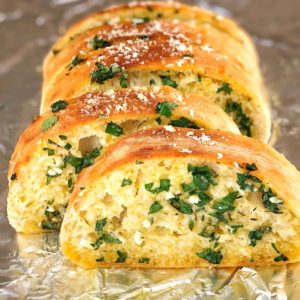 baked bread slices with herbs and garlic
