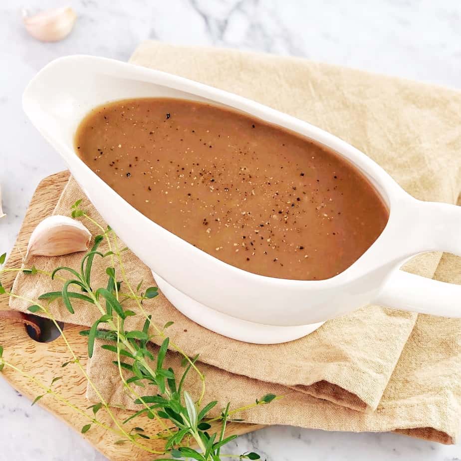 brown gravy in a white gravy boat