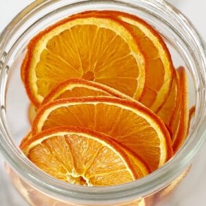 dried slices of orange in a glass jar.